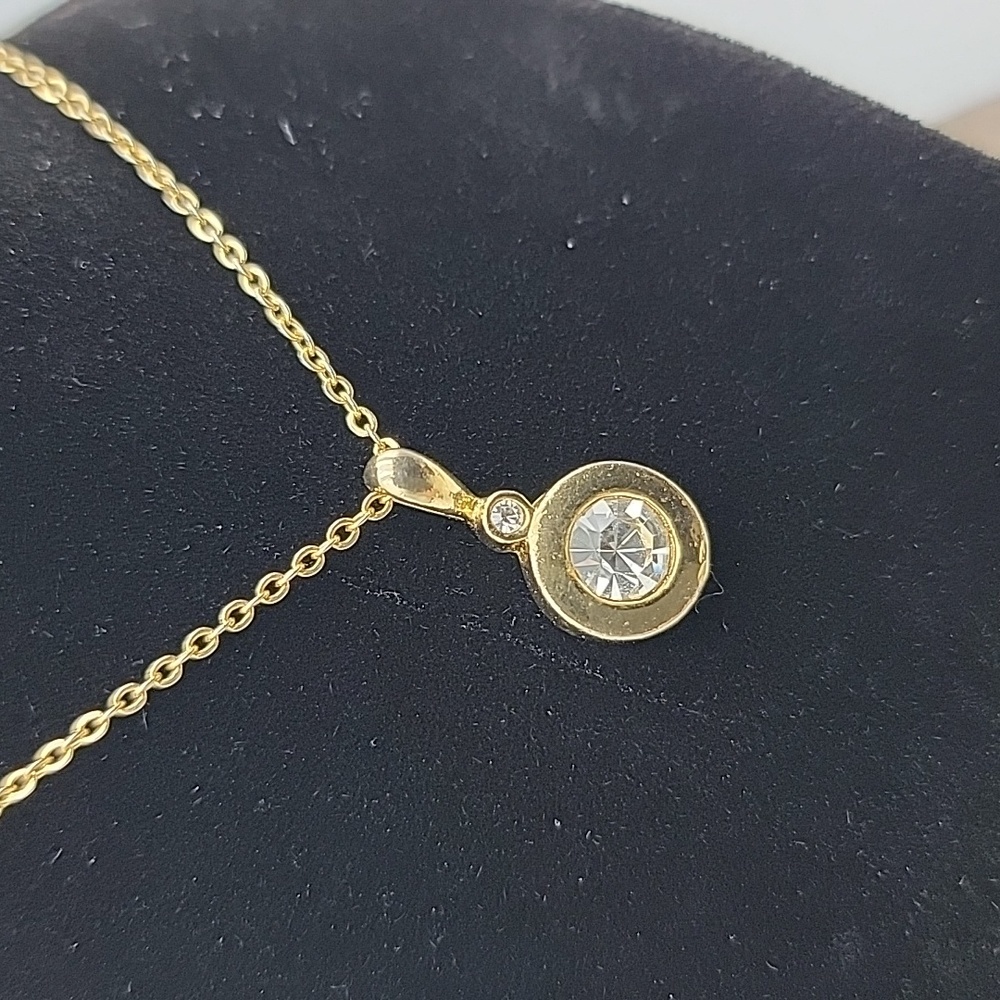 Gold tone Bezel set 2ct. Tw. Stone